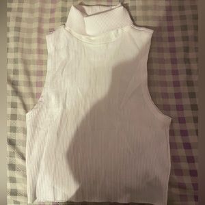 White turtle neck sleeveless shirt